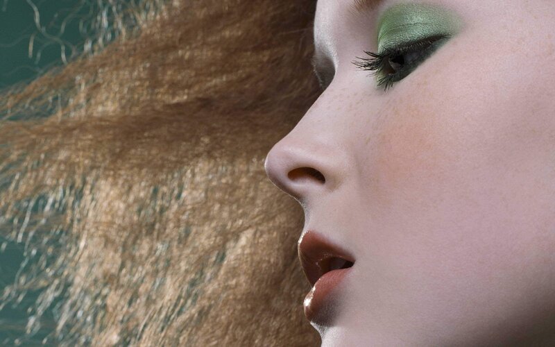 woman with green eyeshadow