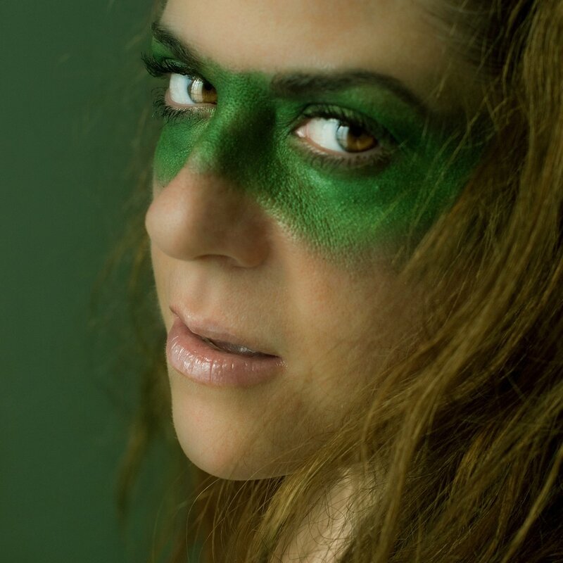 woman with green face paint