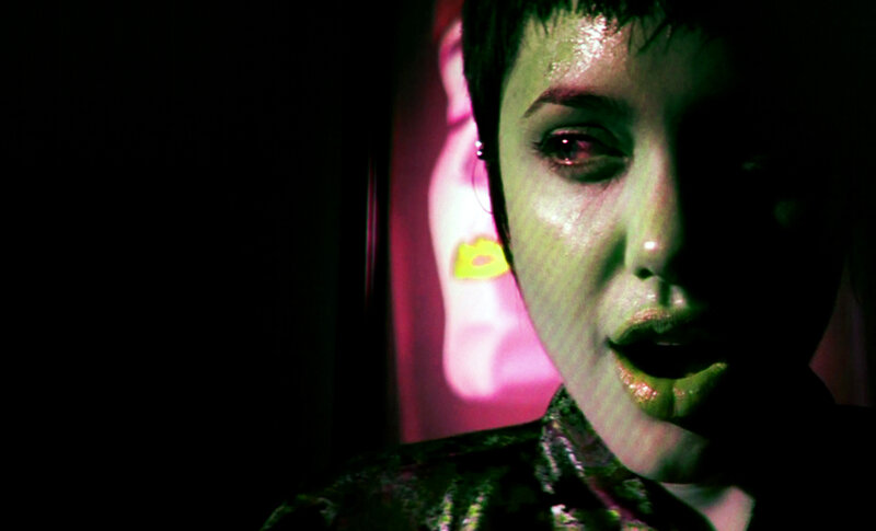 woman with green face paint