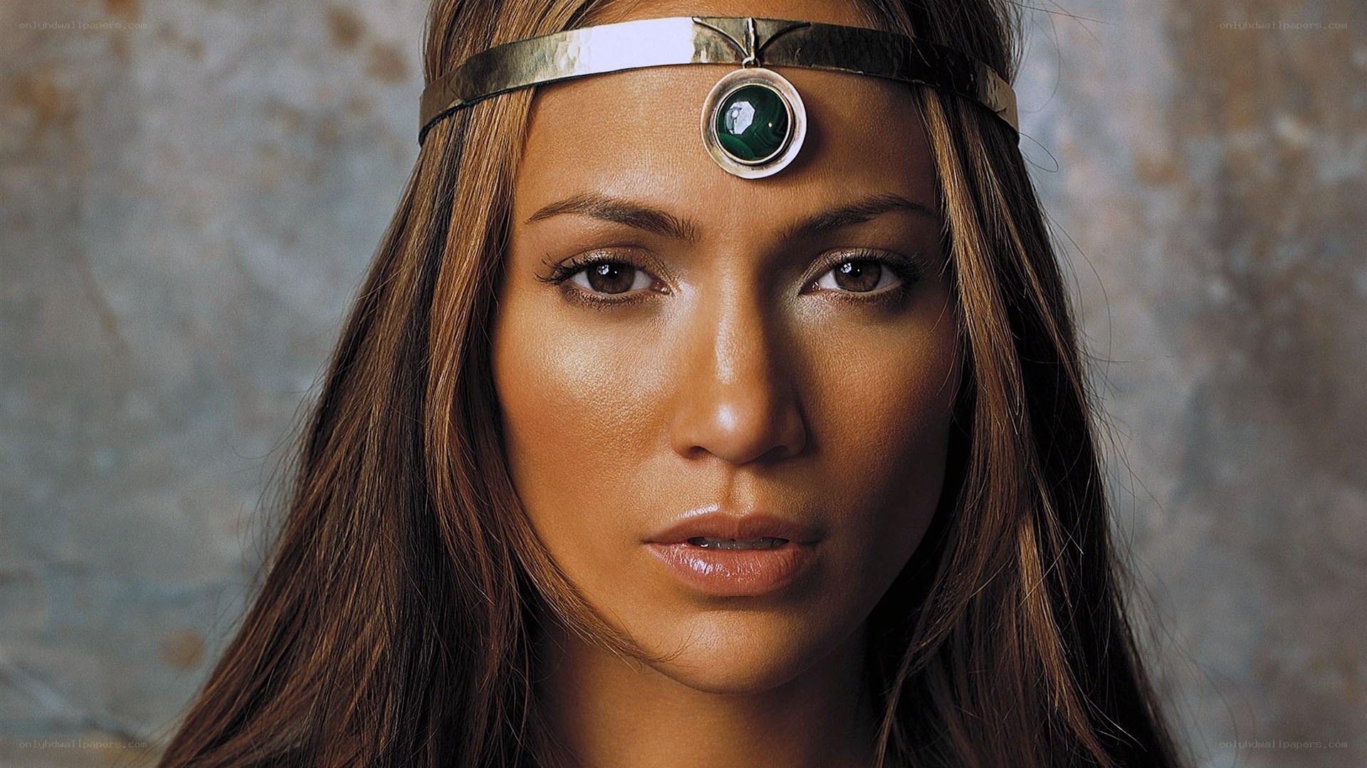 woman with green gem headband