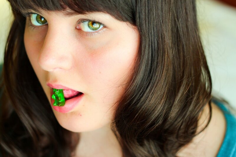woman with green gummy bear