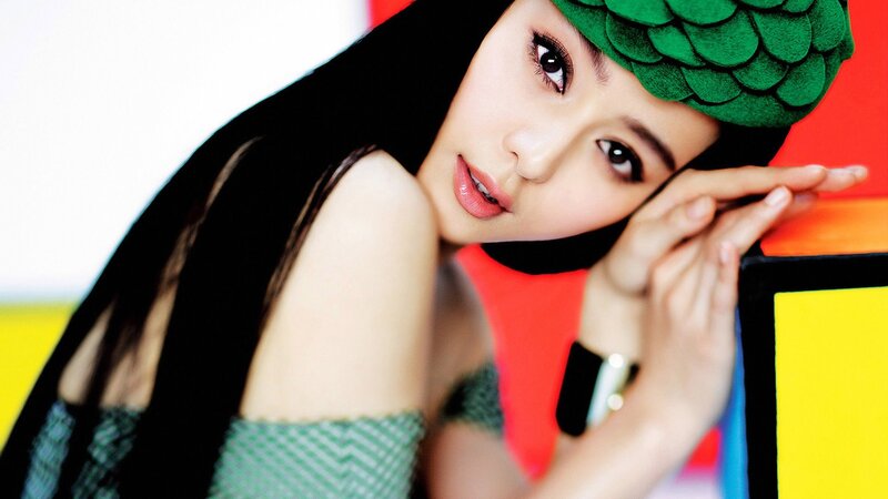 Woman with Green Hat — Vibrant, Photograph