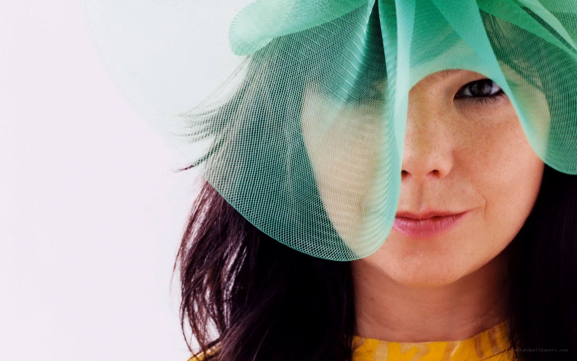 woman with green hat