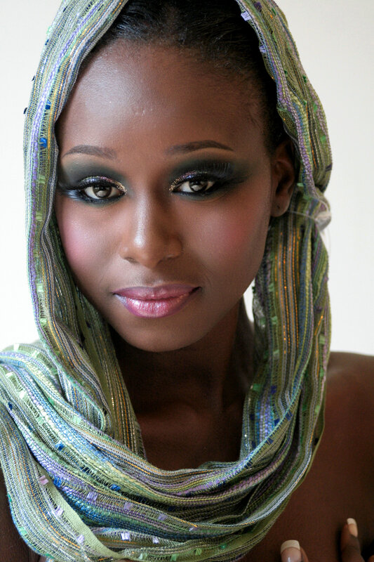 woman with green headscarf