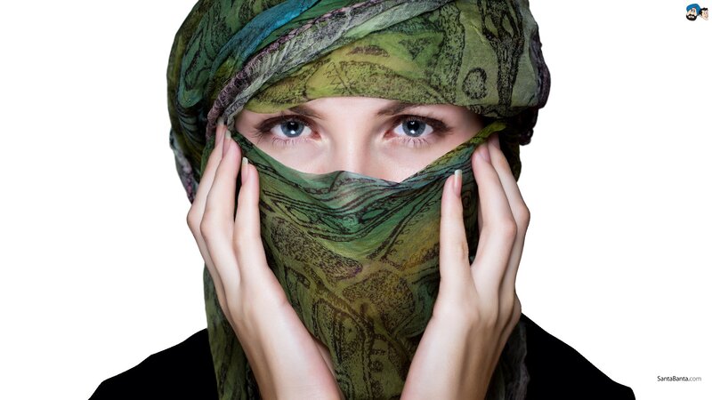 woman with green headscarf