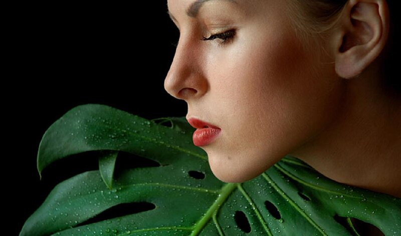 Woman with Green Leaf — Serene