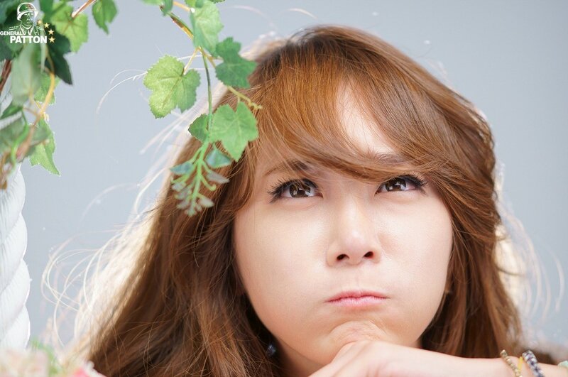 woman with green leaves