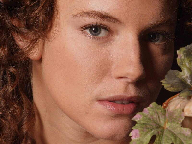 woman with green leaves