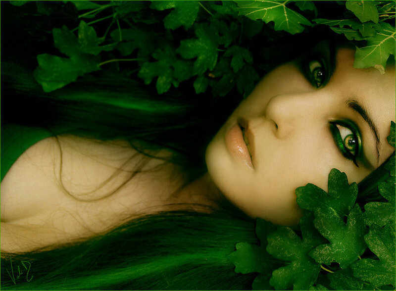 woman with green leaves