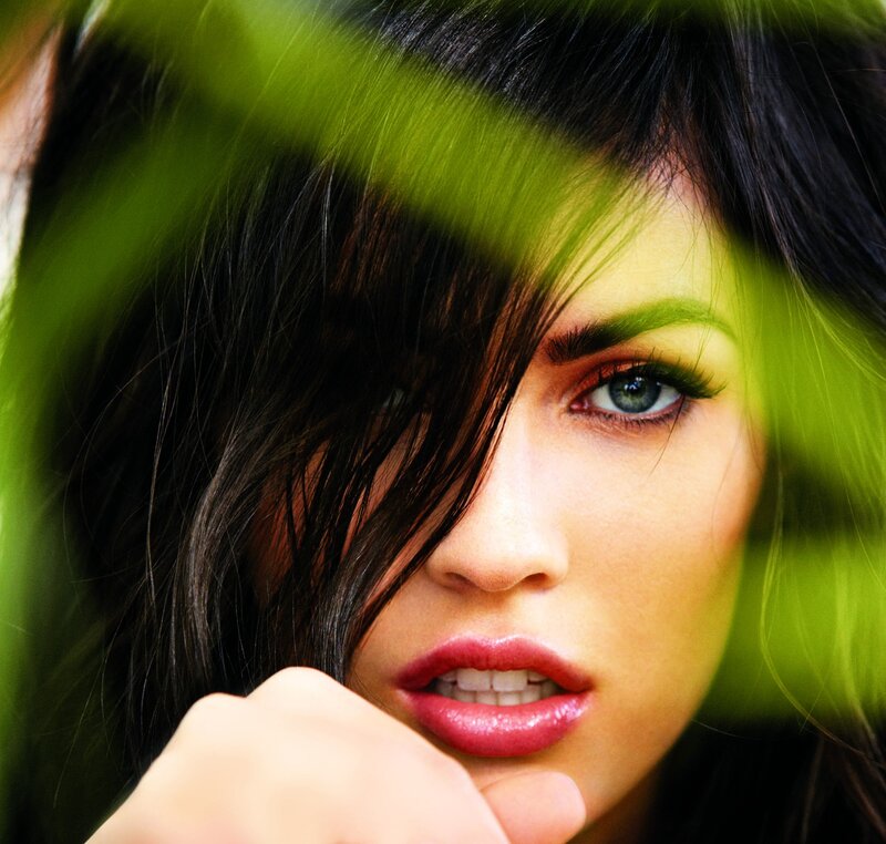 woman with green leaves