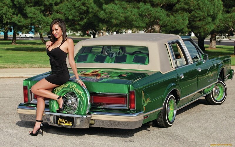 woman with green lowrider car
