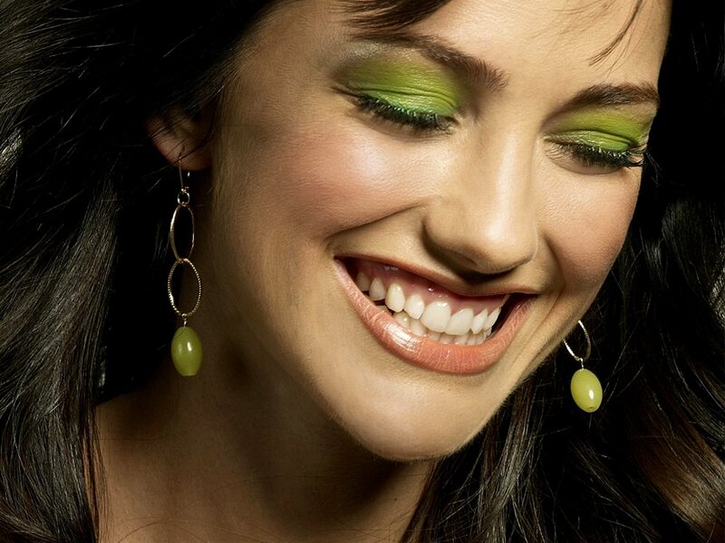 Woman with Green Makeup — Happy