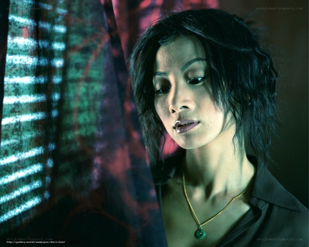 woman with green pendant