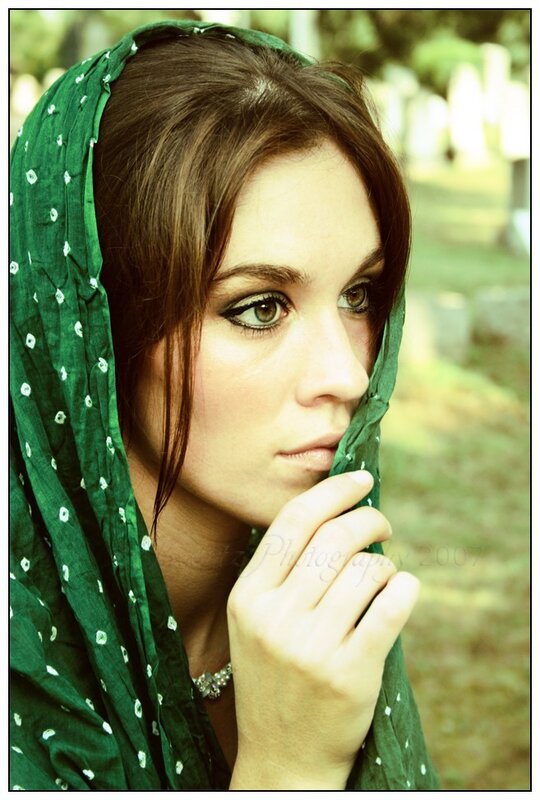 woman with green scarf