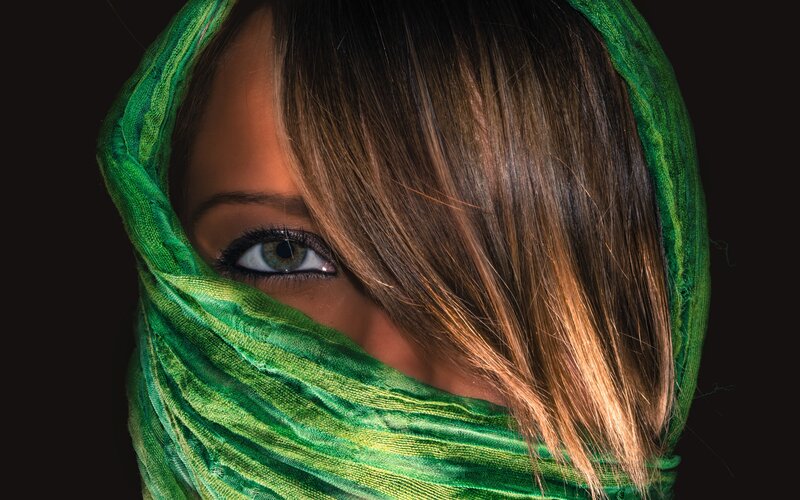woman with green scarf