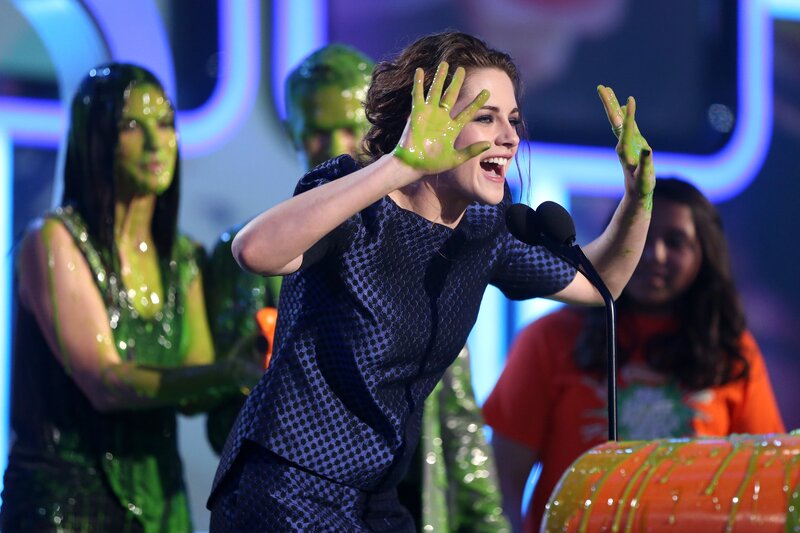 Woman with Green Slime on Hands