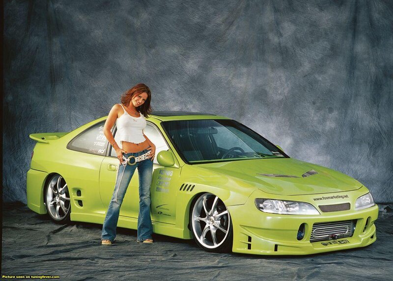 woman with green sports car