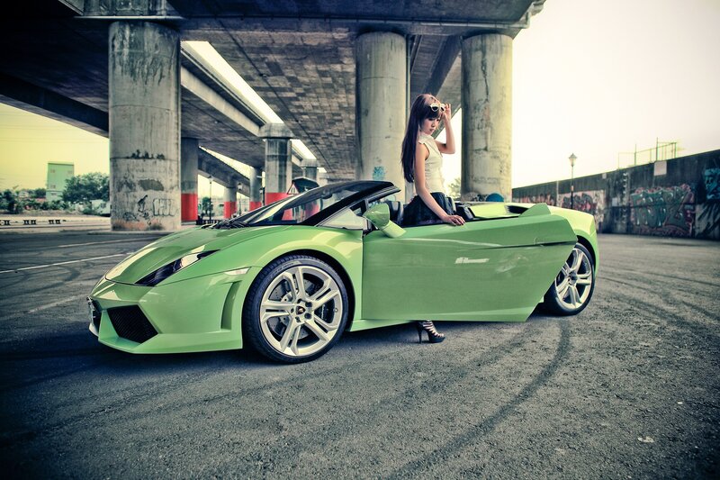 Woman with green sports car