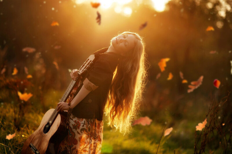 Woman with Guitar — Gold, Serene