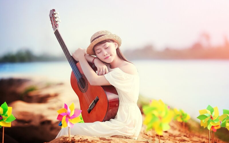 Woman with Guitar — White, Serene, Sunset