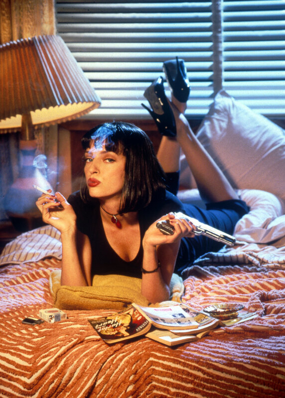 Woman with gun and cigarette
