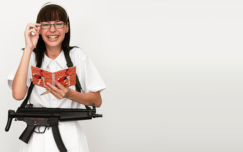 woman with gun and notebook