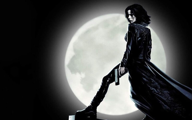 woman with gun in moonlight
