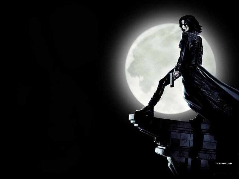 woman with gun on rooftop