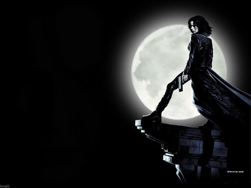 woman with gun on rooftop
