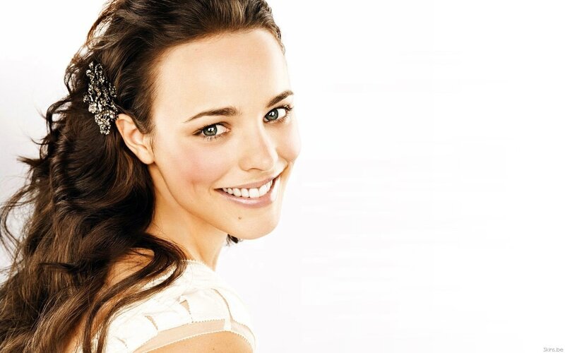 woman with hair accessory smiling