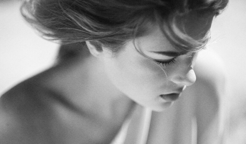 Woman with Hair Blowing — Black, Dramatic, Photograph, Shoulder