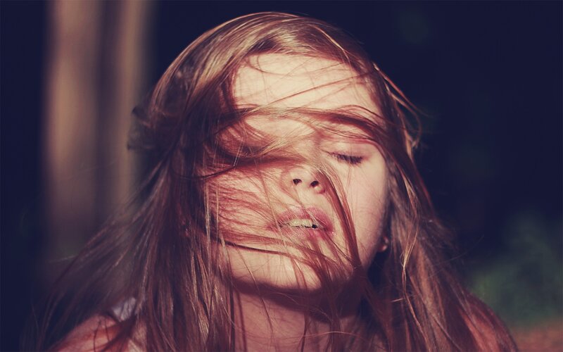 Woman with Hair Blowing — Brown