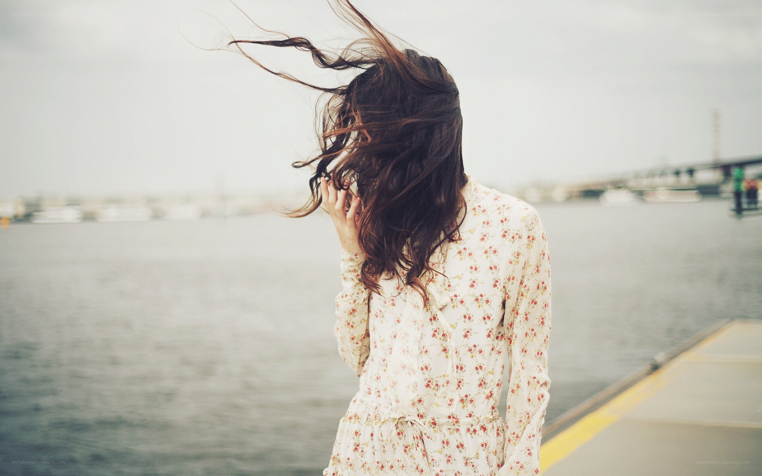 woman with hair blowing in wind