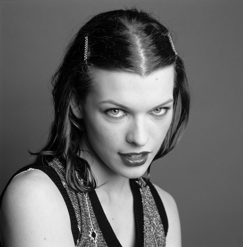 woman with hair clips in black and white