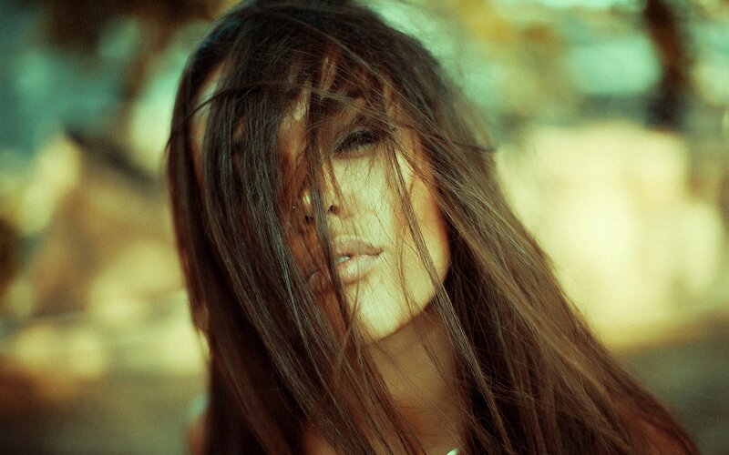 woman with hair in face