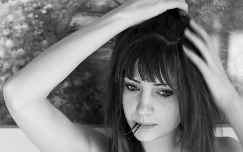 woman with hair in hands