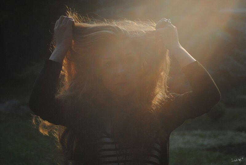 woman with hair in sunlight