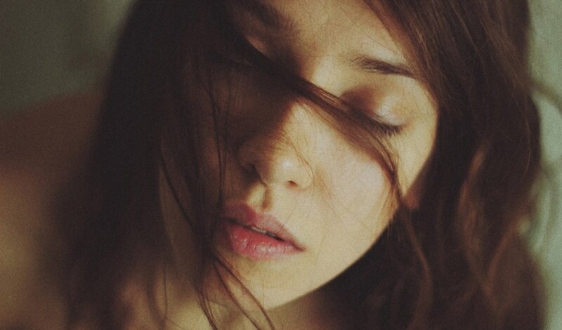 woman with hair over face