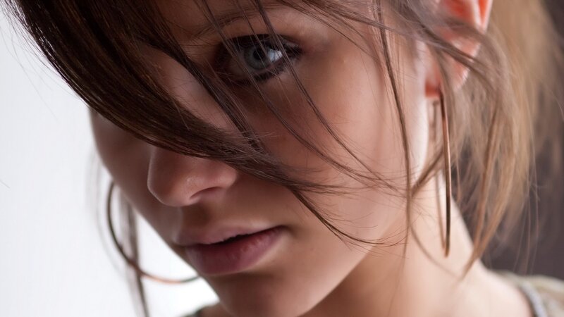 woman with hair over face