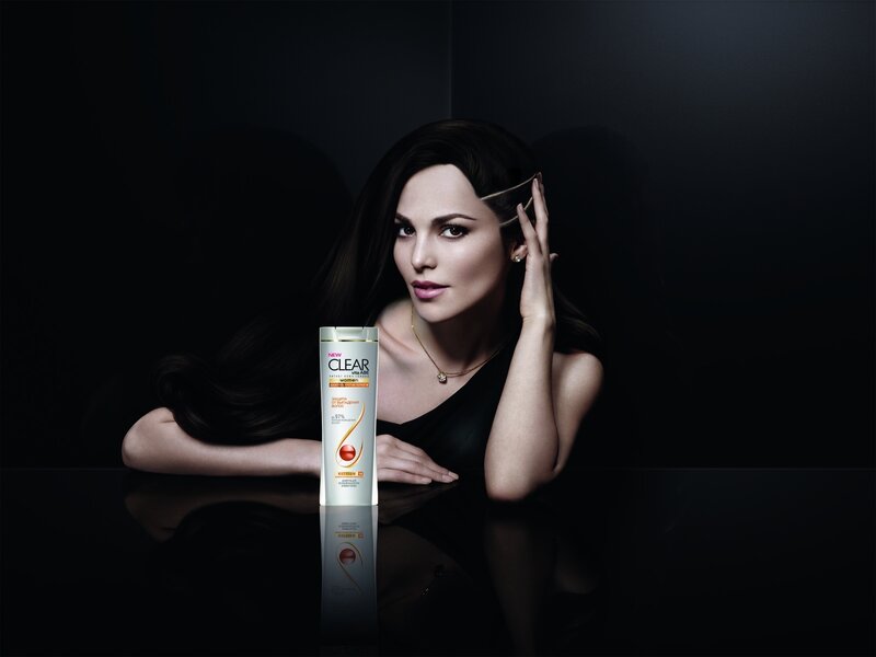 woman with hair product