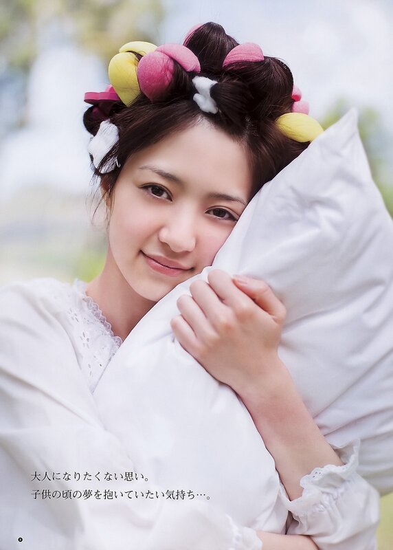 woman with hair rollers