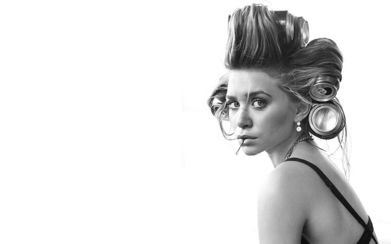 woman with hair rollers