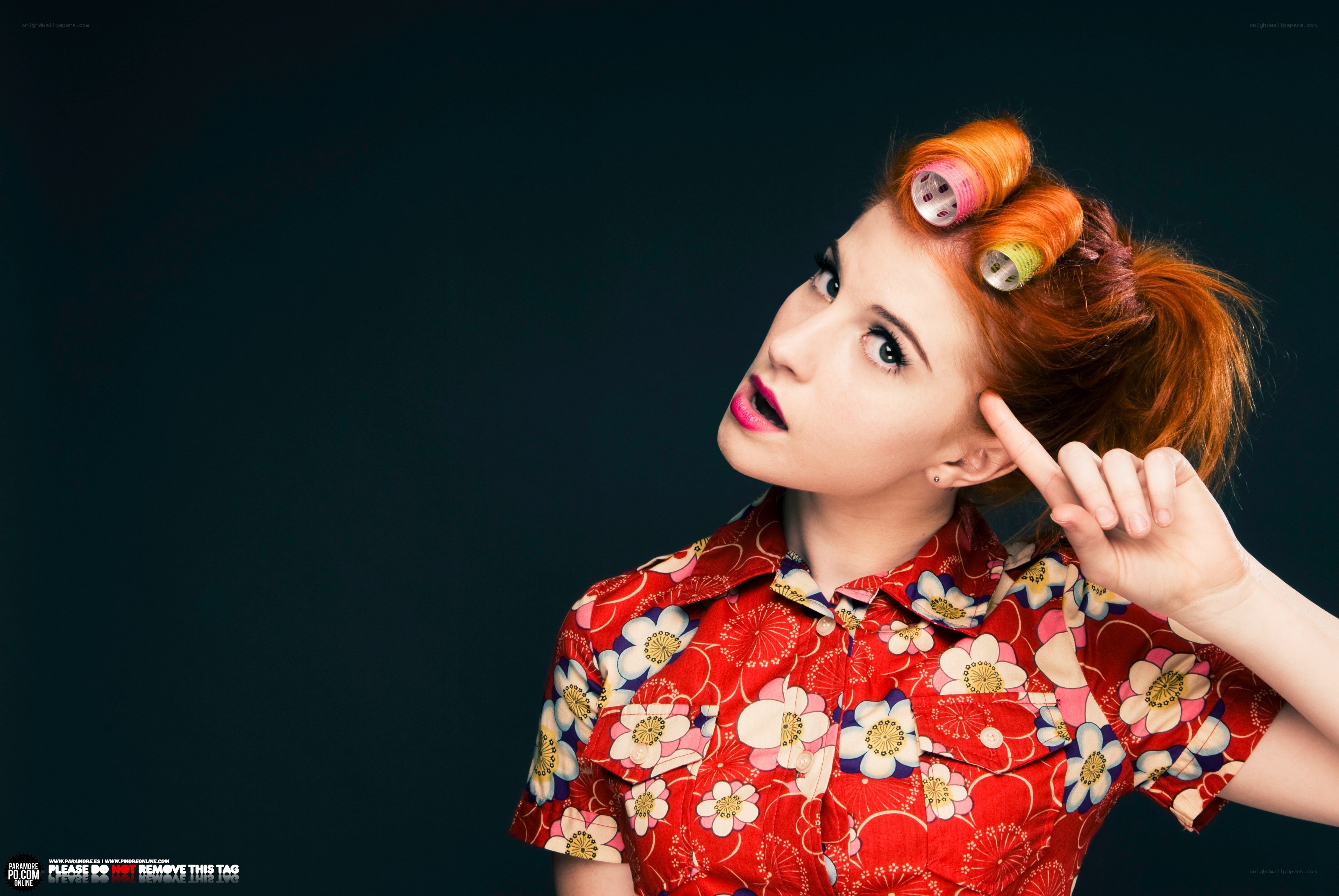 woman with hair rollers