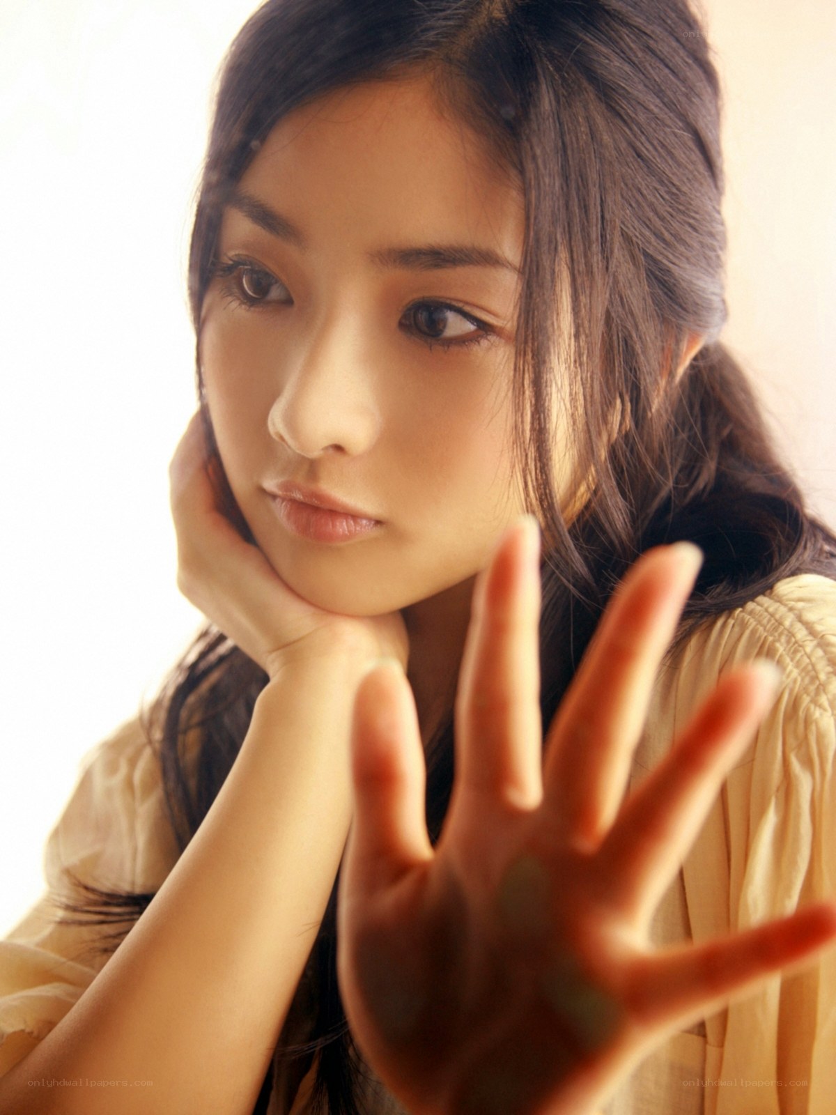 woman with hand extended