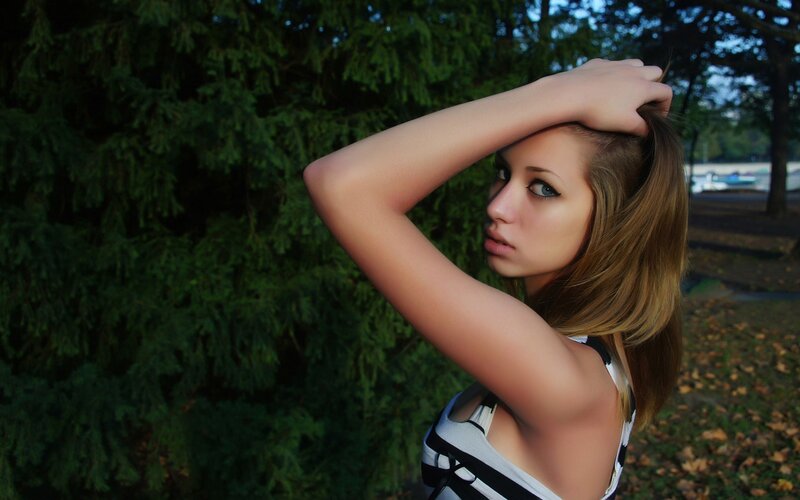 woman with hand in hair