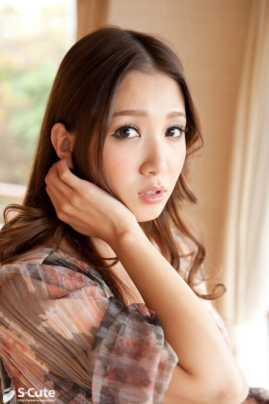 woman with hand on cheek