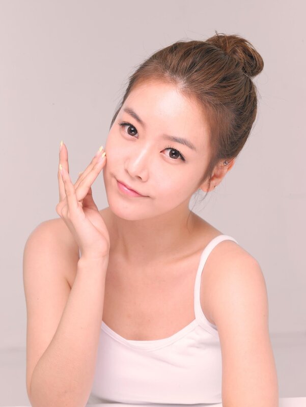 woman with hand on cheek