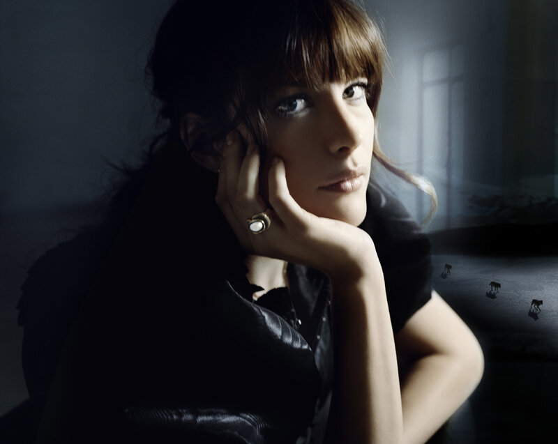 woman with hand on cheek