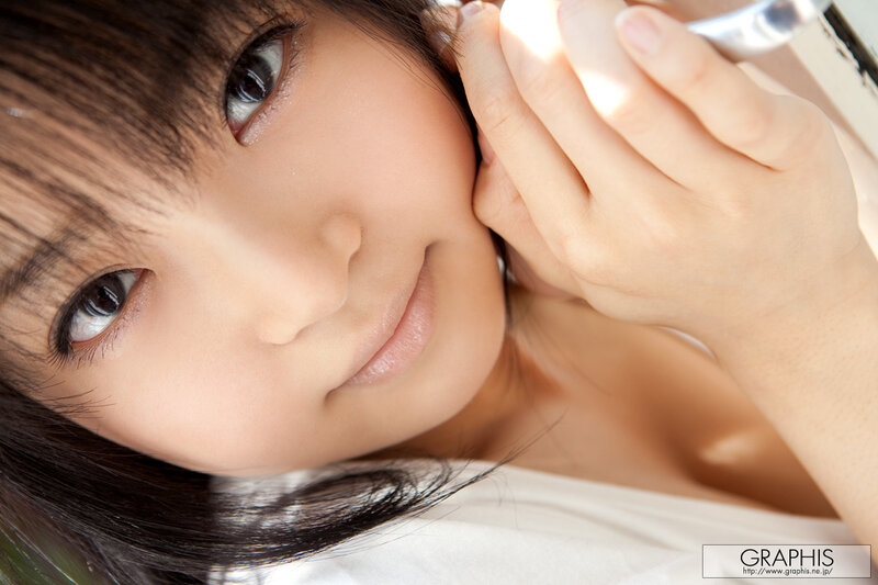 woman with hand on cheek