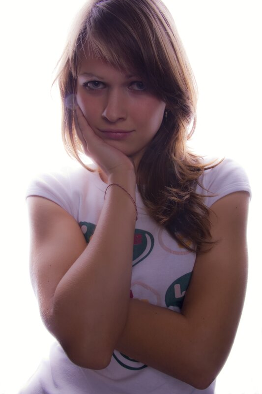 woman with hand on chin